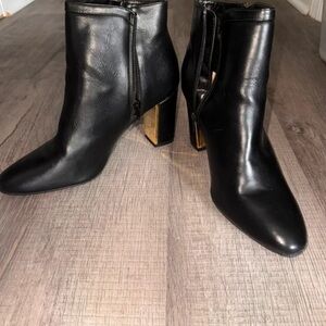 Sleek Black Ankle Heeled Boots with Gold Block Heel